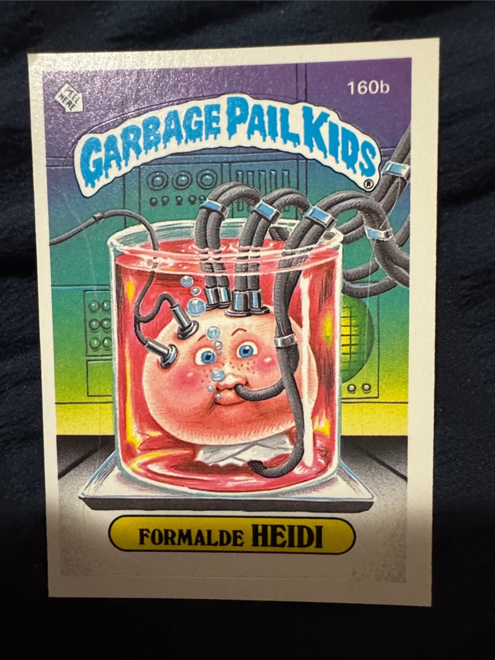 Garbage Pail Kids 'Formalde Heidi' Trading Card - Purple/Green Artwork